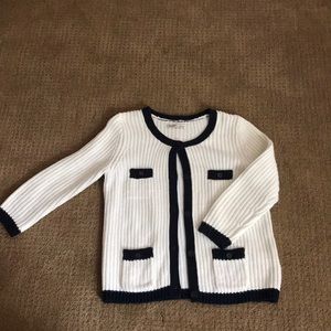 White and blue boating sweater